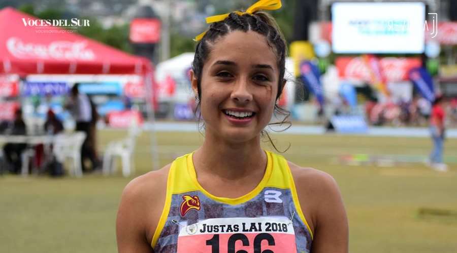 Erika Serrano, de la UPR de Humacao, ganó medalla de oro en los 100 metros con vallas. (Voces del Sur / Revista J / Jean Cosme Crespo)